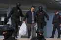 Montenegrin police officers escort South Korean citizen, Terraform Labs founder Do Kwon, center, in…